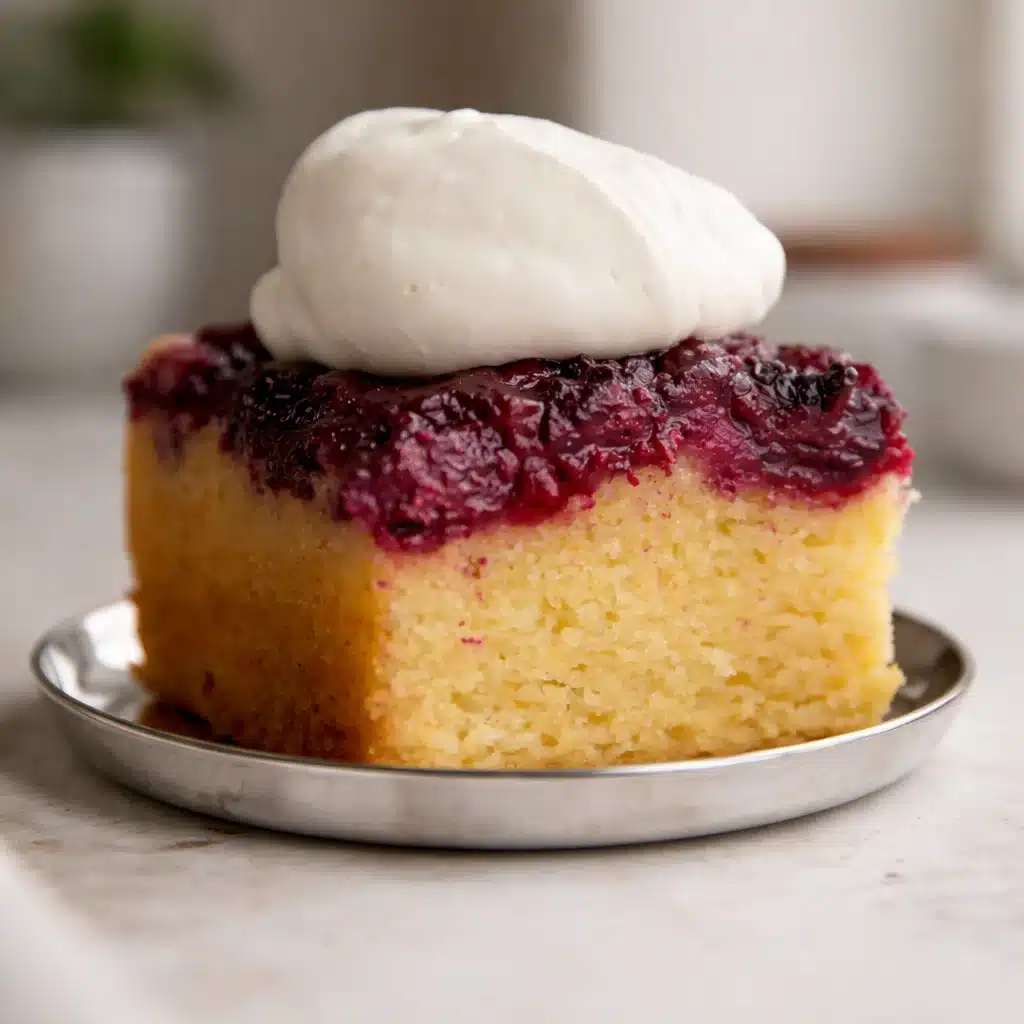 Delicious Berry Upside-Down Cake topped with caramelized mixed berries.