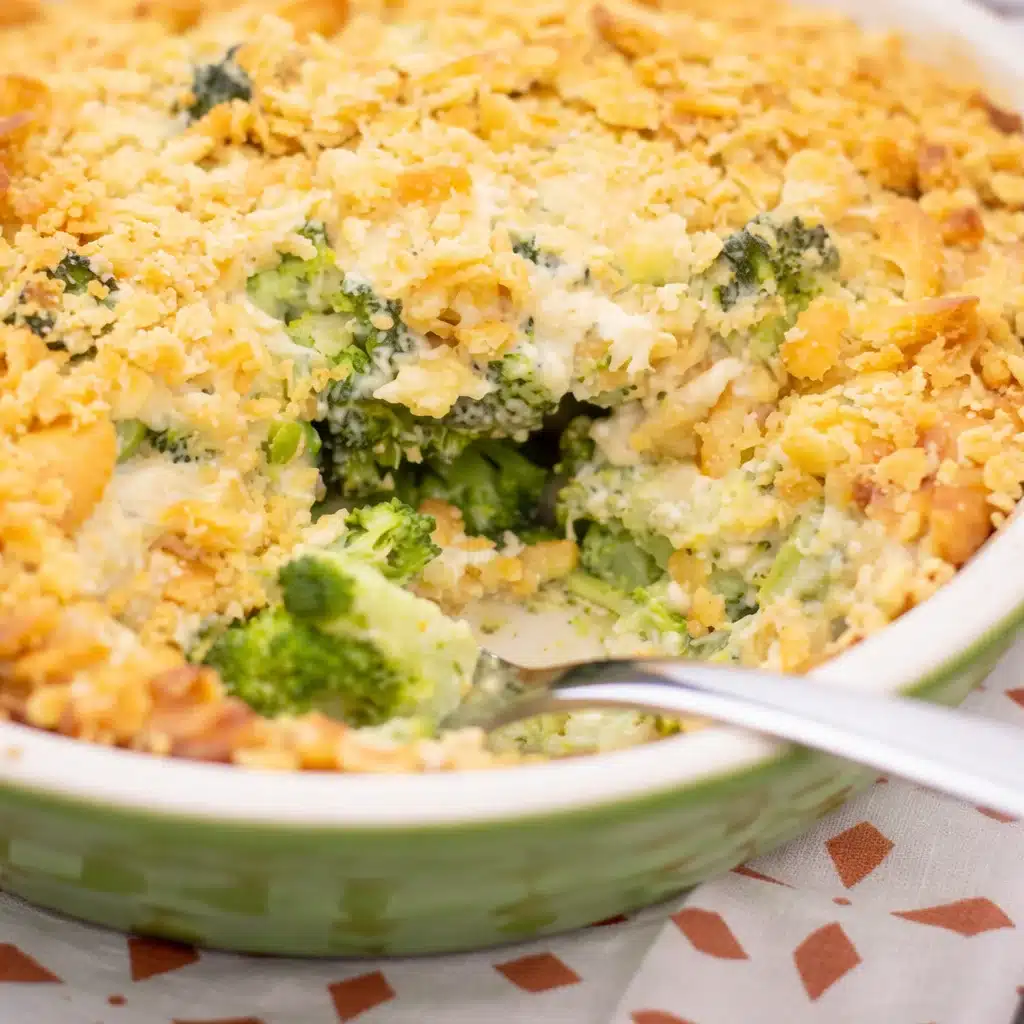 Delicious broccoli casserole with creamy sauce and cheesy breadcrumb topping.