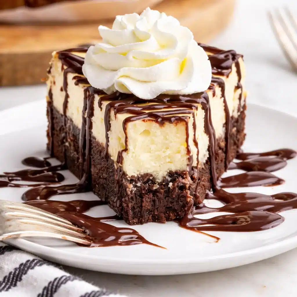 Rich Brownie Bottom Cheesecake topped with creamy cheesecake and chocolate drizzle