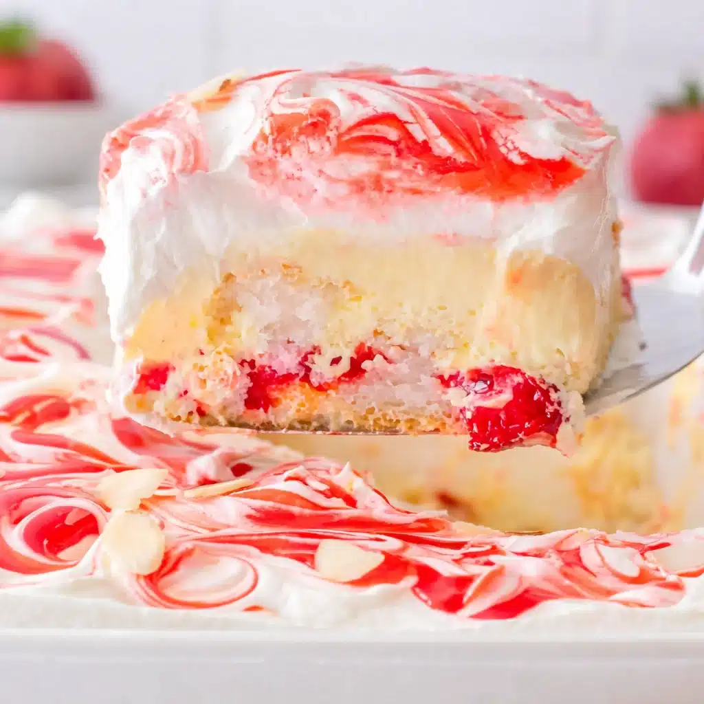 Heaven On Earth Cake with layers of angel food cake, cherry filling, and whipped topping.