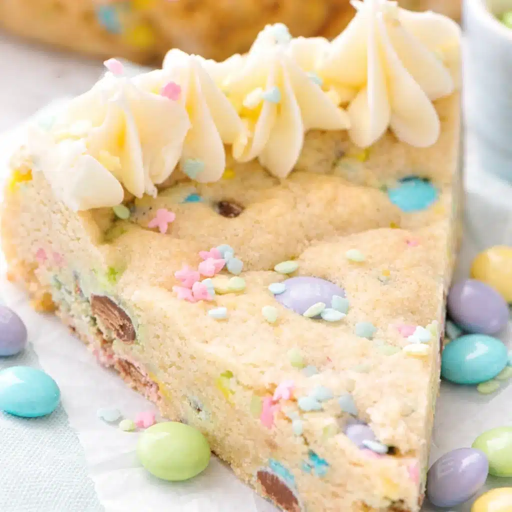 A festive Easter Cookie Cake loaded with colorful candies and chocolate chips.