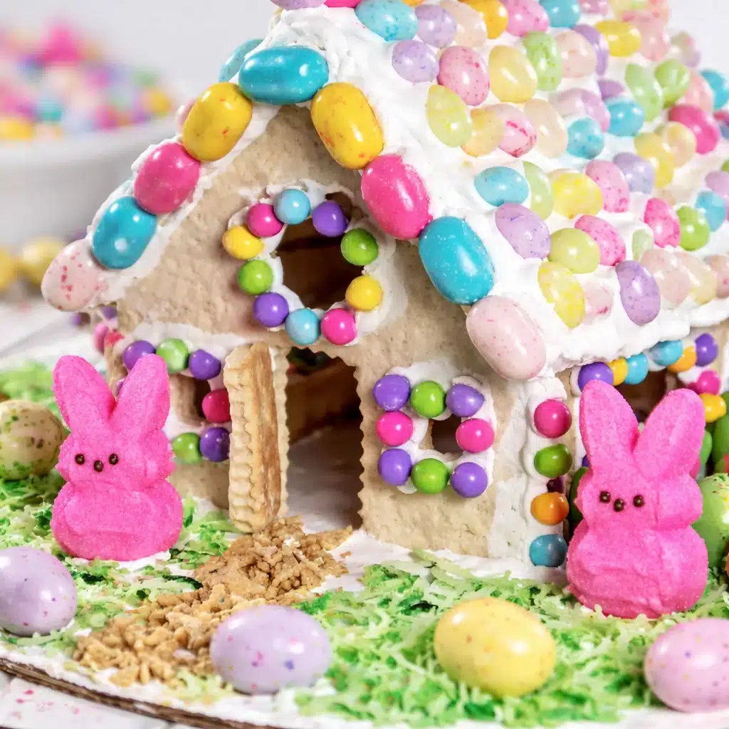 Easter Sugar Cookie House decorated with candy and colorful icing