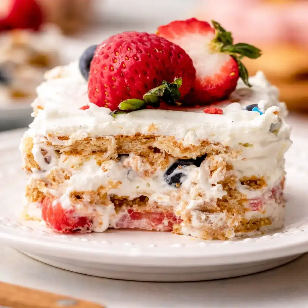 No-Bake Berry Icebox Cake with layers of fresh berries and cream cheese mixture
