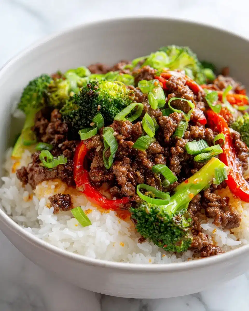 20 Minute Honey Sriracha Beef Bowl with vibrant vegetables and rice