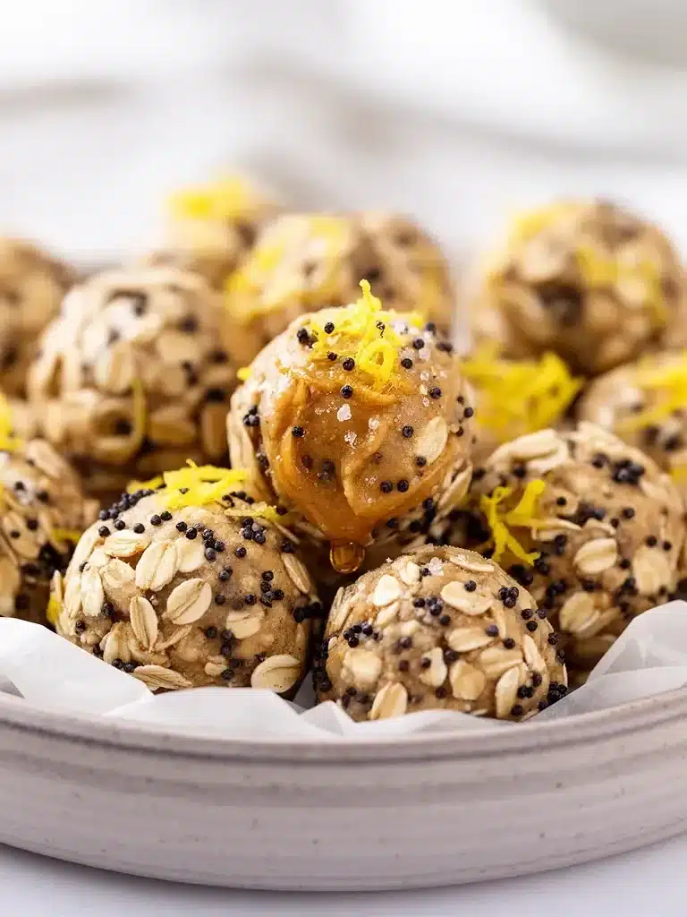No-bake lemon poppyseed protein balls on a plate, healthy snack option