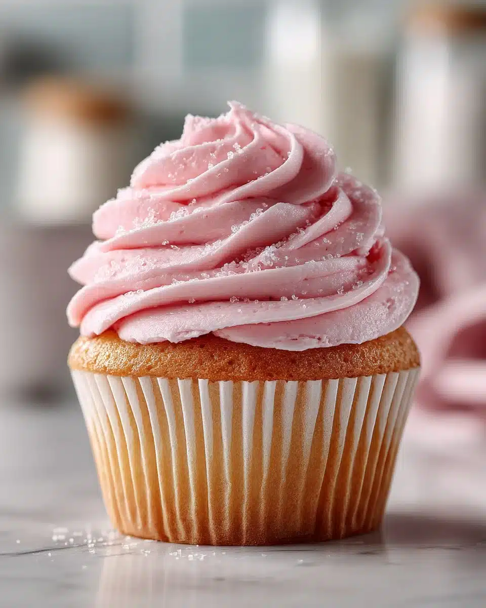 Delicious strawberry marshmallow frosting on a cake